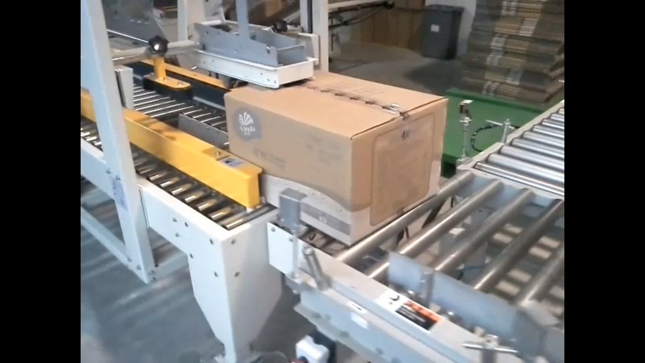 紙巾廠(chǎng)自動(dòng)開(kāi)箱折蓋封箱機(jī)案例視